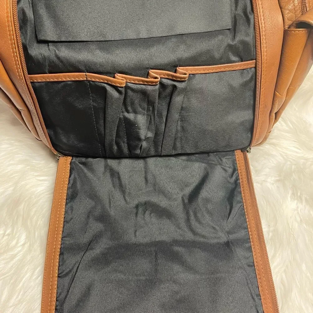 Unbranded tan leather large Backpack antique tone hardwares.